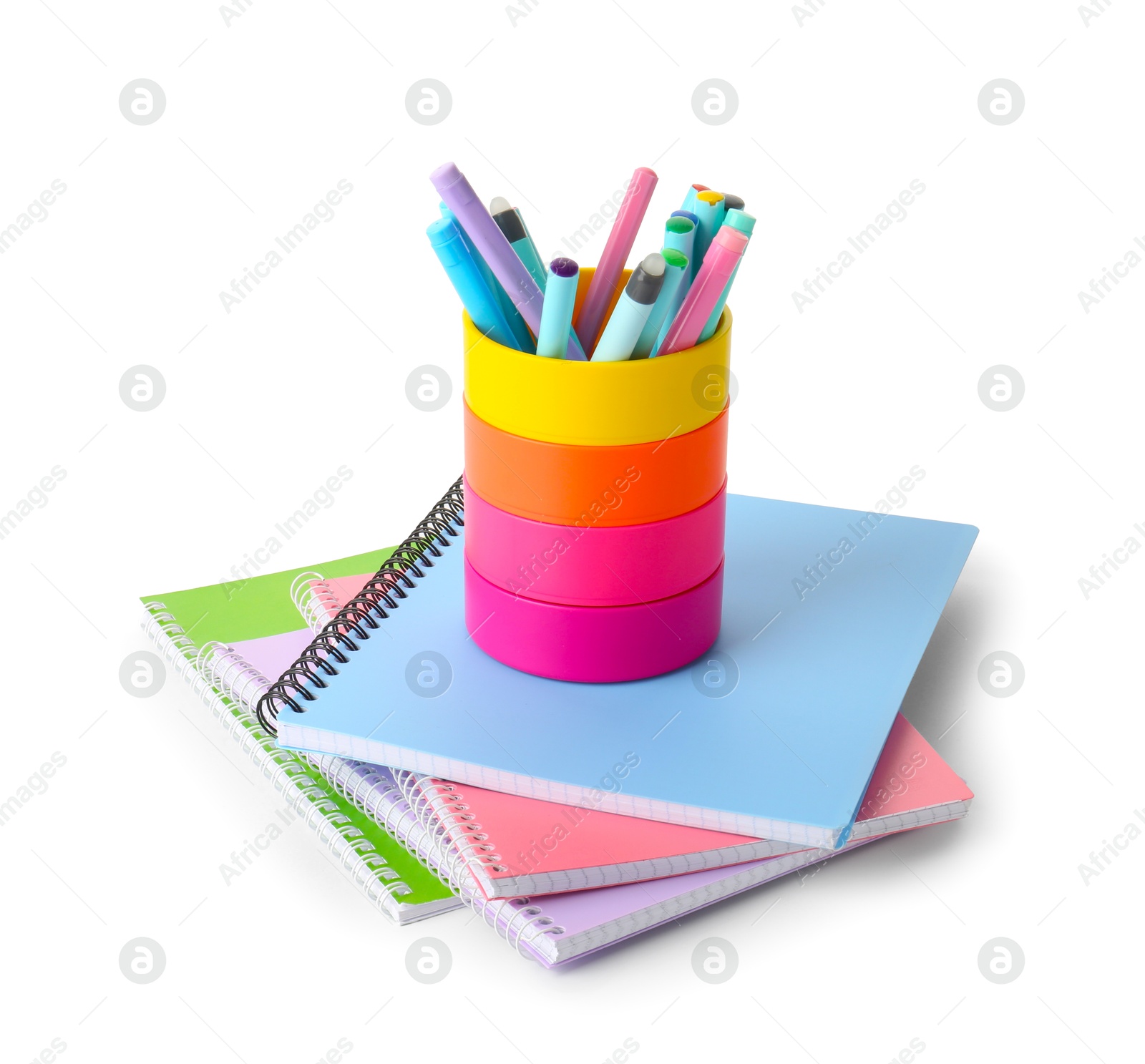 Photo of Notebooks and other different stationery isolated on white