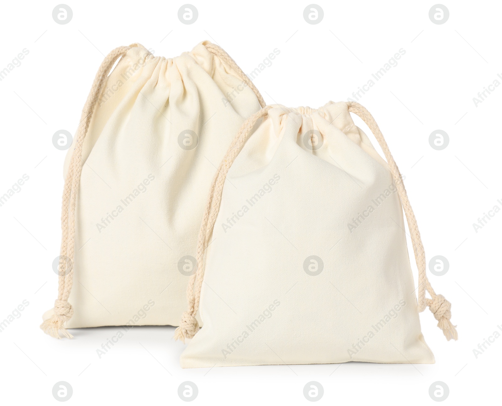 Photo of Two cotton bags with ties isolated on white