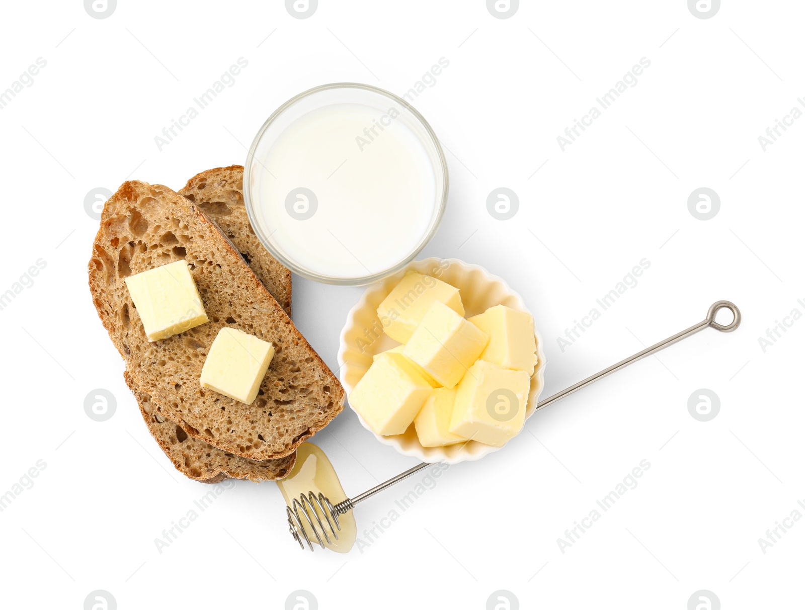 Photo of Slices of bread with butter, milk and honey isolated on white, top view