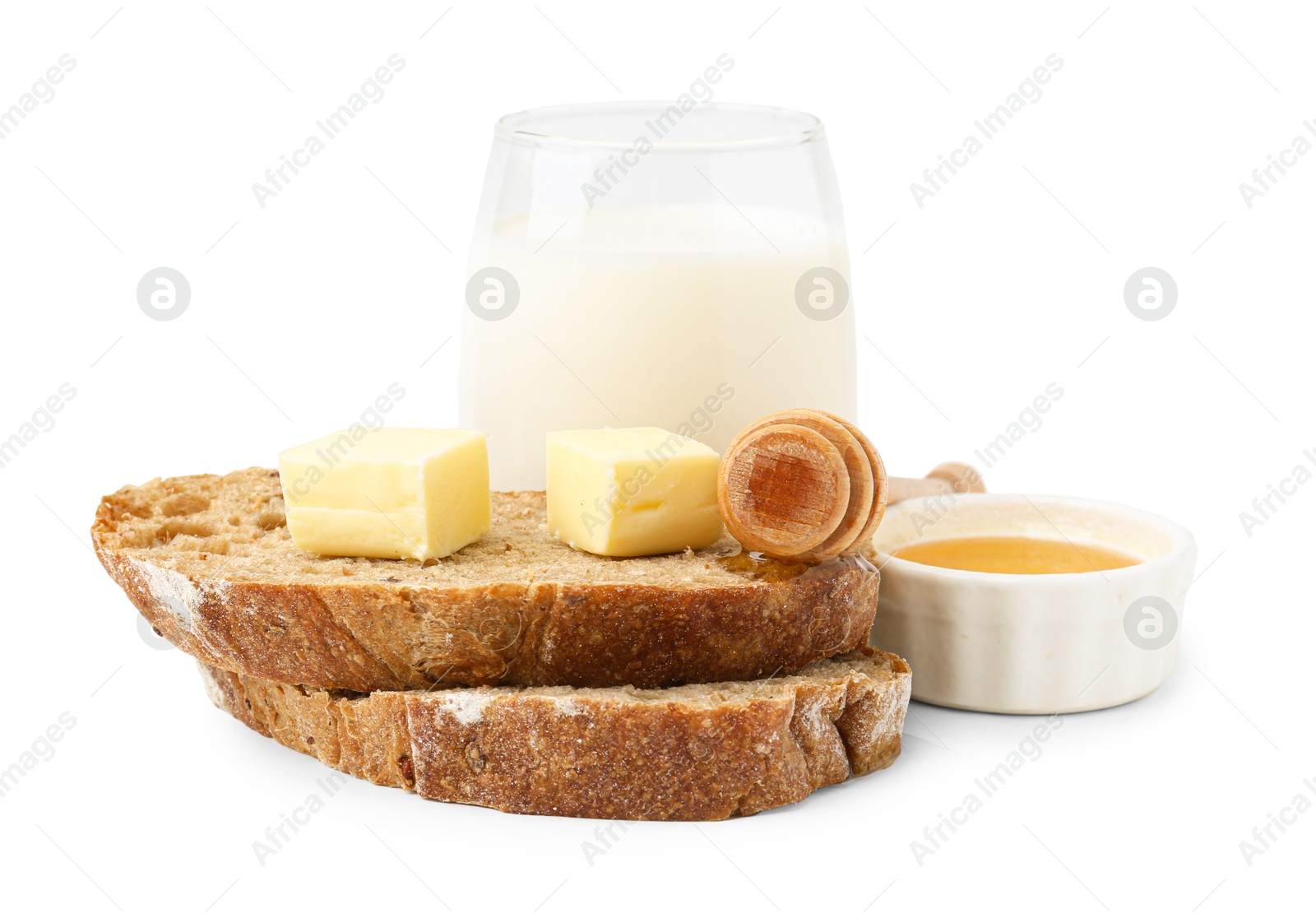 Photo of Slices of bread with butter, milk and honey isolated on white