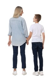 Photo of Mother and son on white background, back view