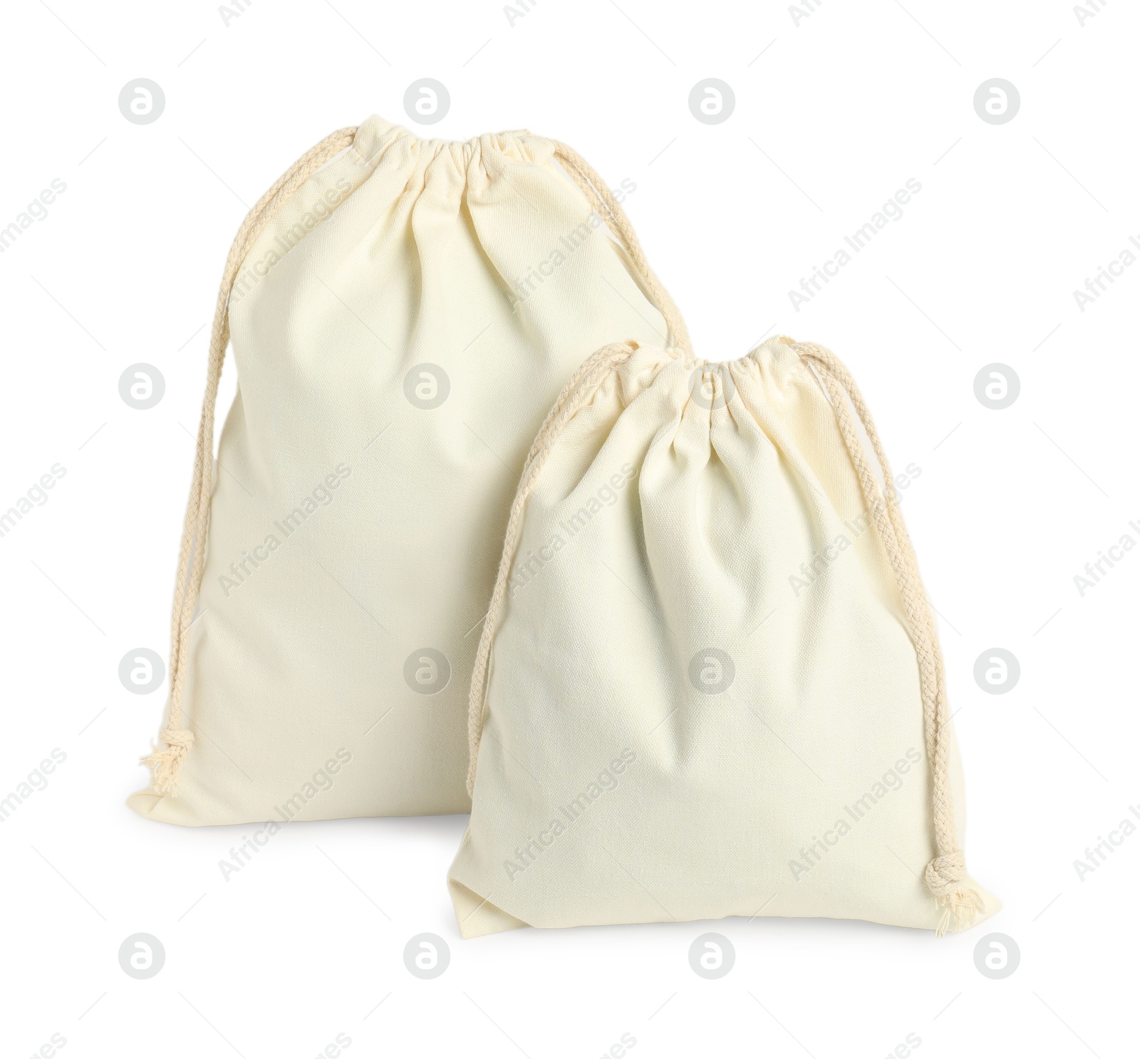 Photo of Two cotton bags with ties isolated on white