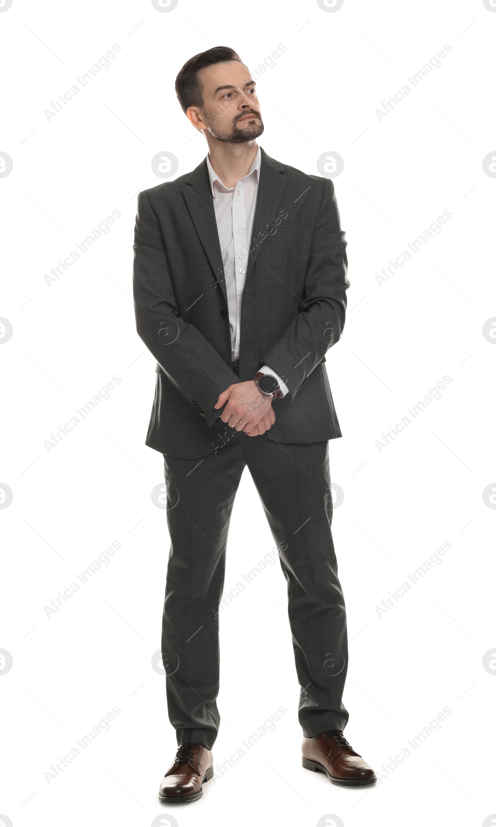 Photo of Confident man in classic suit on white background