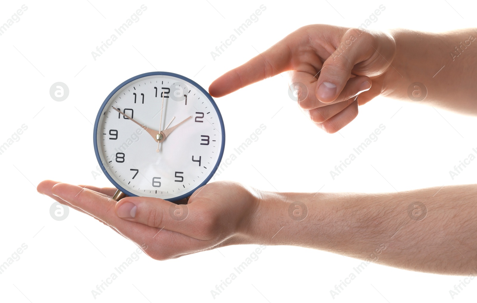 Photo of Man with alarm clock on white background, closeup