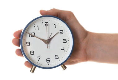 Photo of Man with alarm clock on white background, closeup