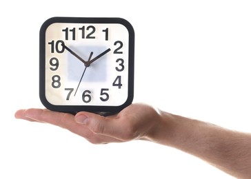 Photo of Man with alarm clock on white background, closeup