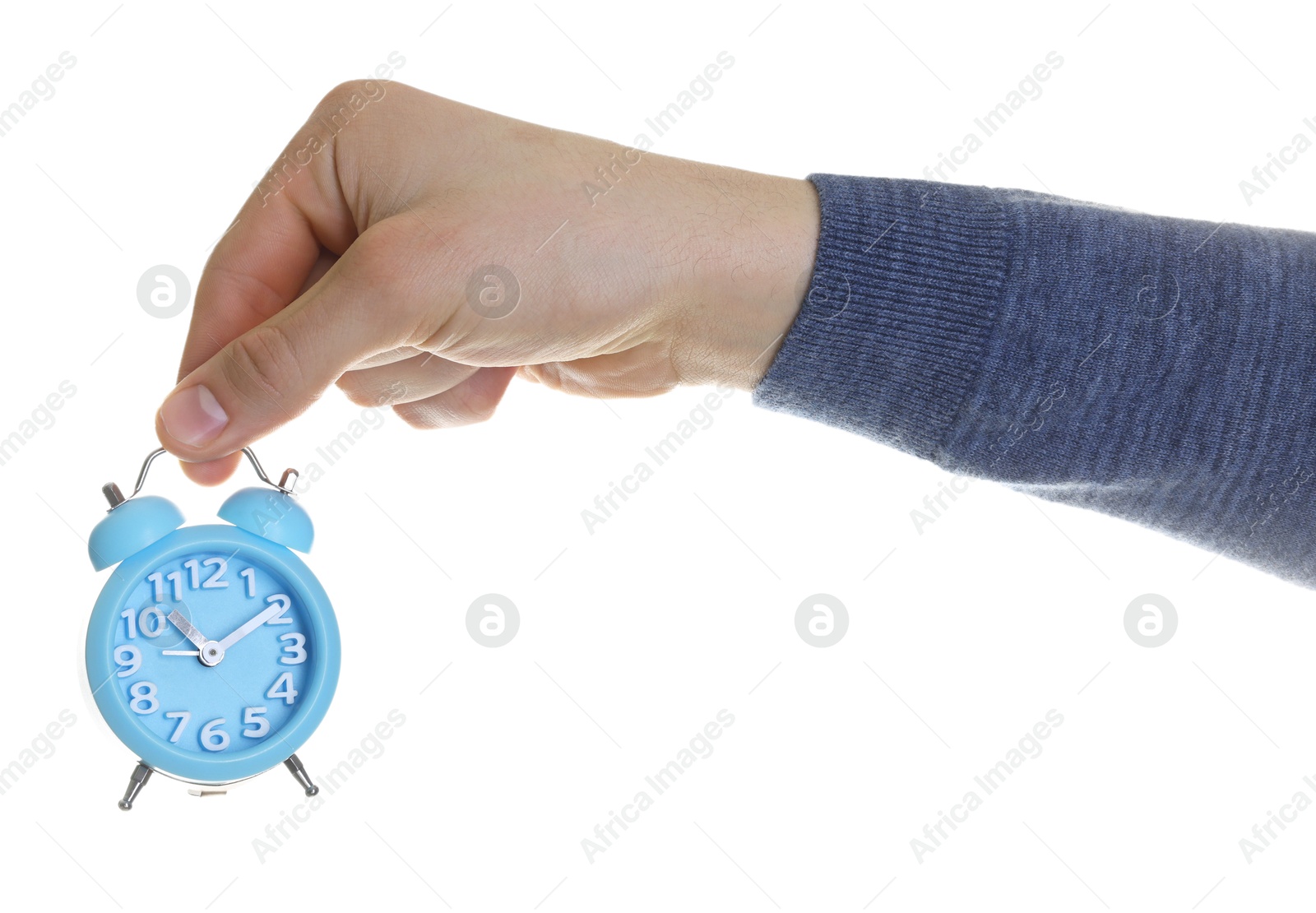 Photo of Man with light blue alarm clock on white background, closeup