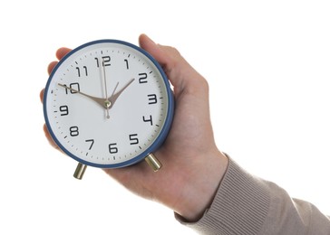 Man with alarm clock on white background, closeup