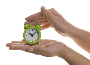 Photo of Woman with alarm clock on white background, closeup