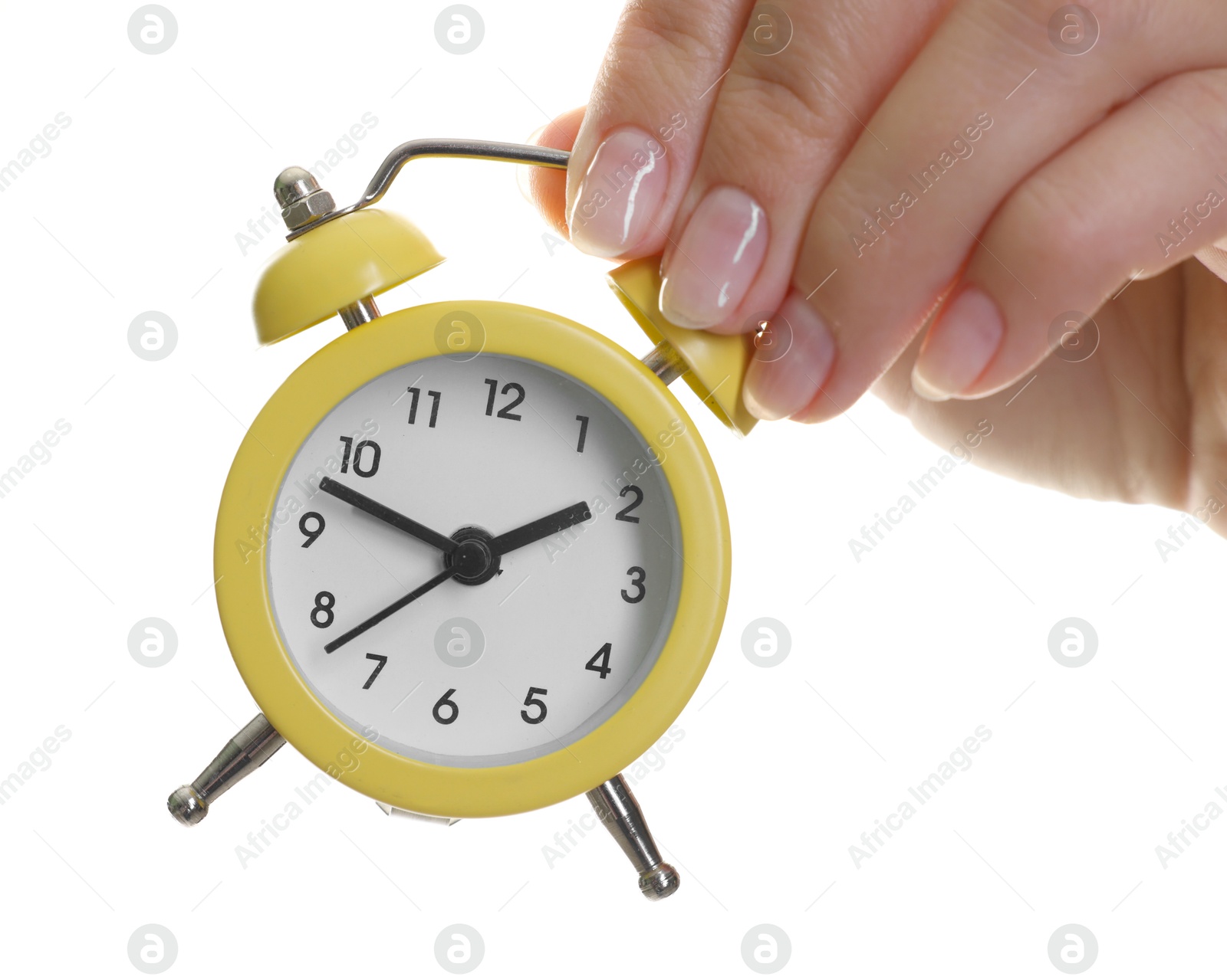 Photo of Woman with alarm clock on white background, closeup