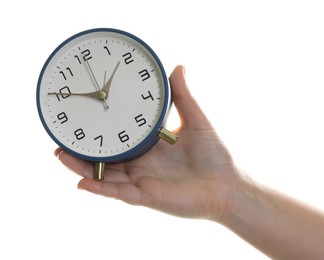 Photo of Woman with alarm clock on white background, closeup