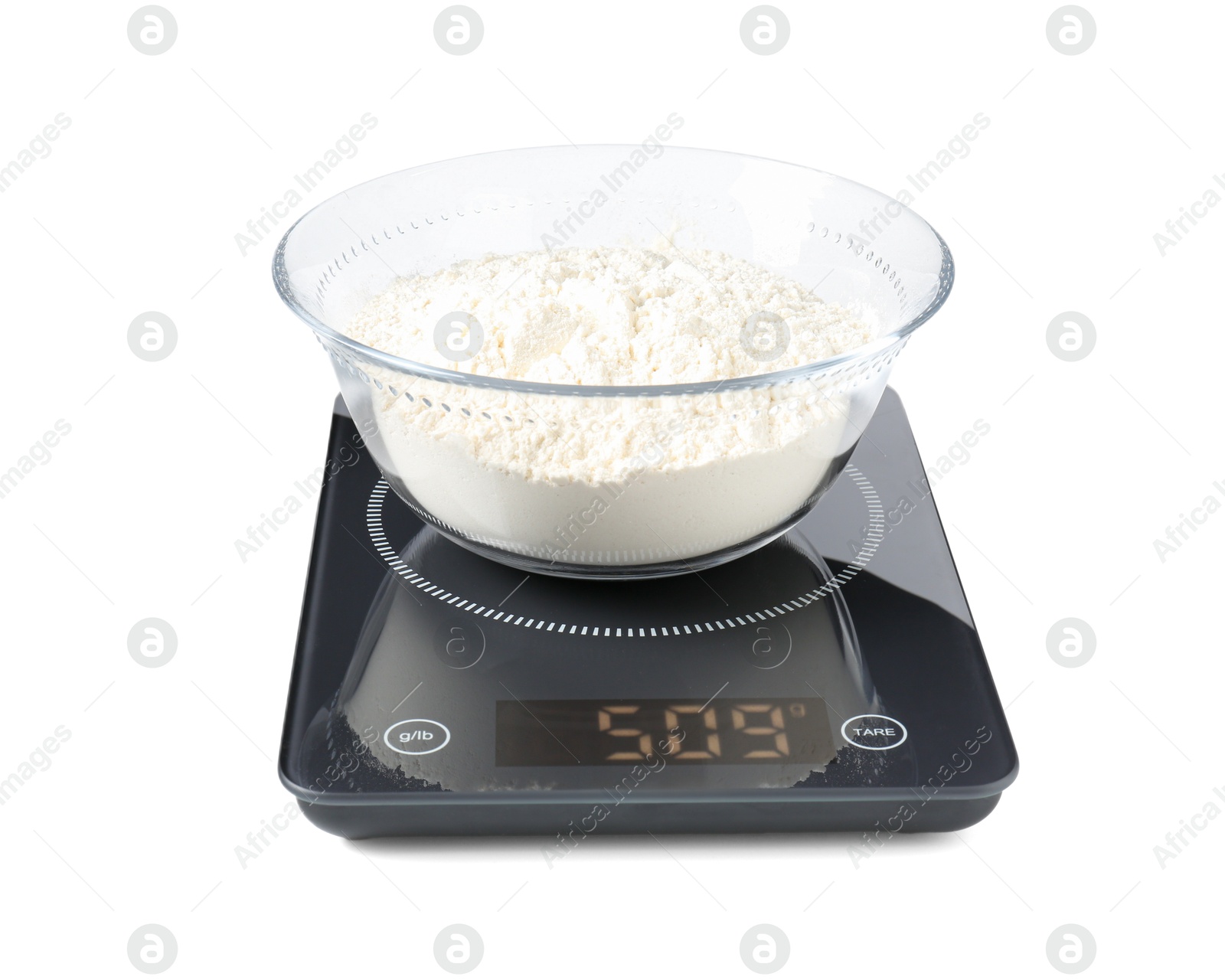 Photo of Modern electronic kitchen scale with flour isolated on white