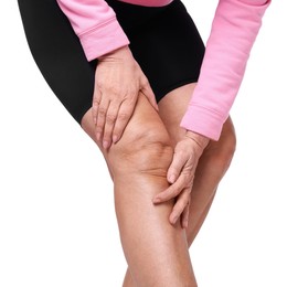 Photo of Woman suffering from pain in her knee on white background, closeup