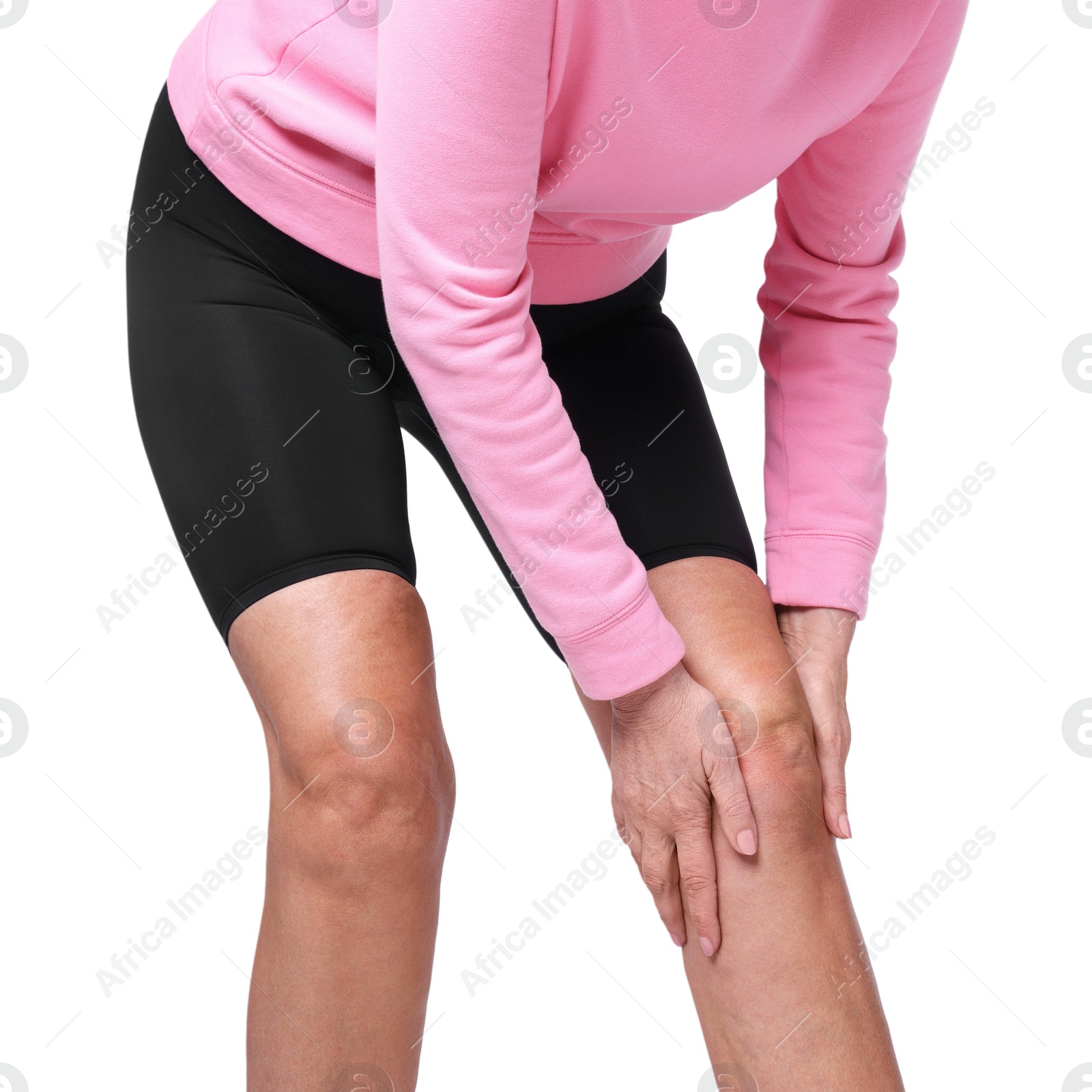 Photo of Woman suffering from pain in her knee on white background, closeup