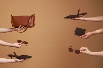 Photo of Women with stylish accessories and shoes on brown background, closeup. Space for text