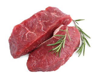 Photo of Pieces of raw beef meat with rosemary isolated on white