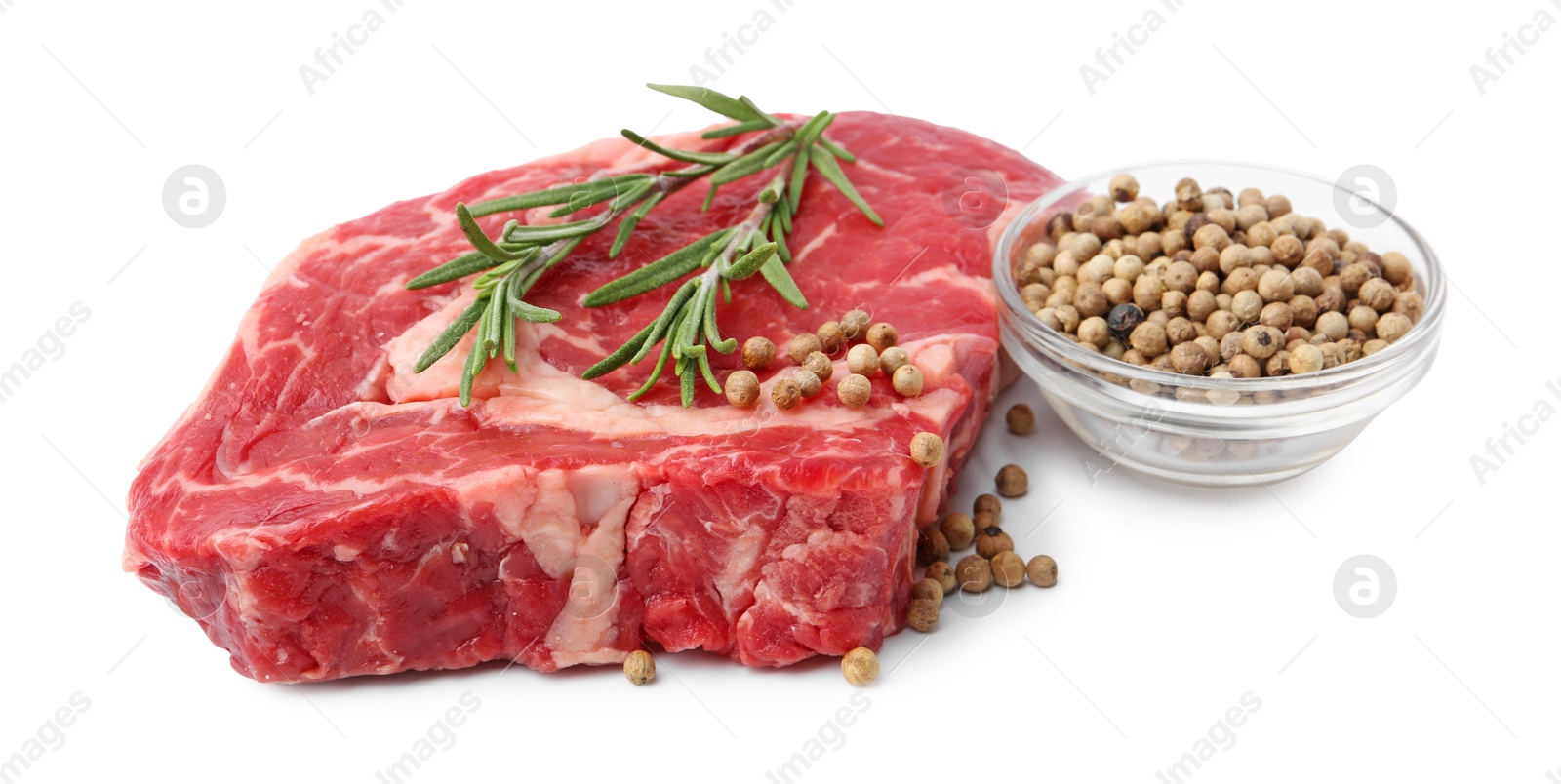 Photo of Piece of raw beef meat and spices isolated on white