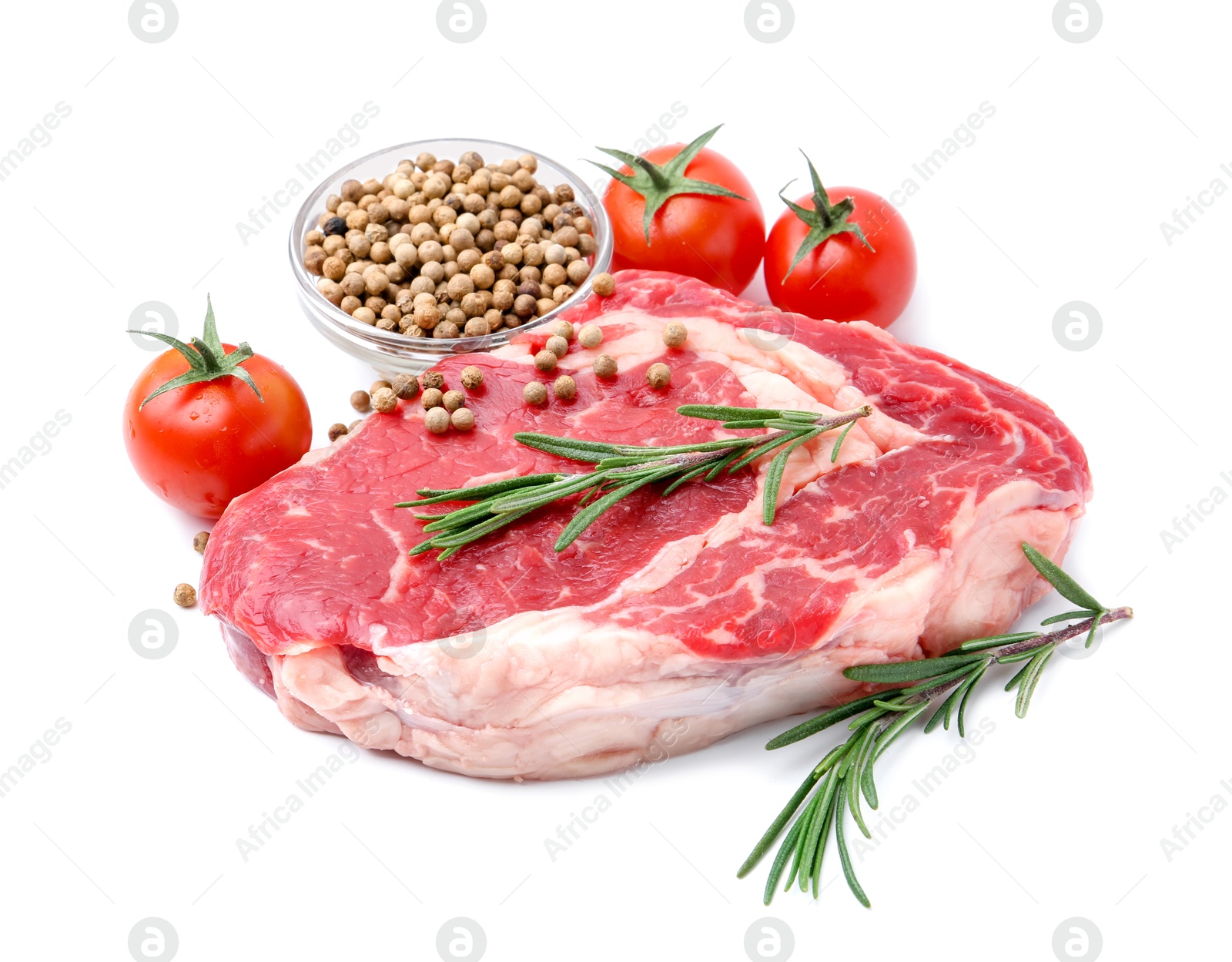 Photo of Piece of raw beef meat, tomatoes and spices isolated on white