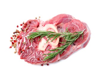 Photo of Piece of raw beef meat and spices isolated on white, top view