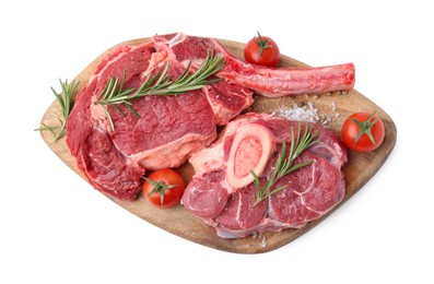 Photo of Pieces of raw beef meat, spices and tomatoes isolated on white