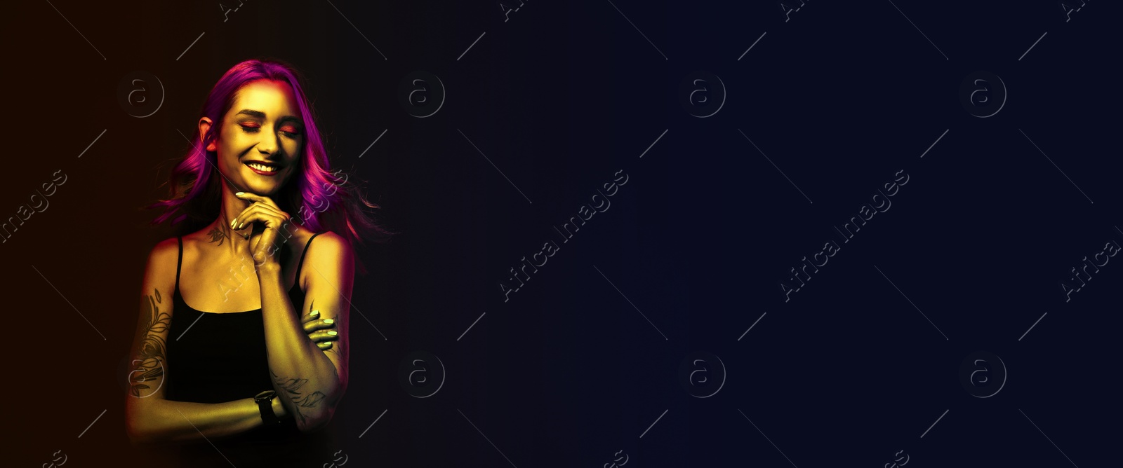 Image of Beautiful woman with tattoos on body in neon light, space for text. Banner design