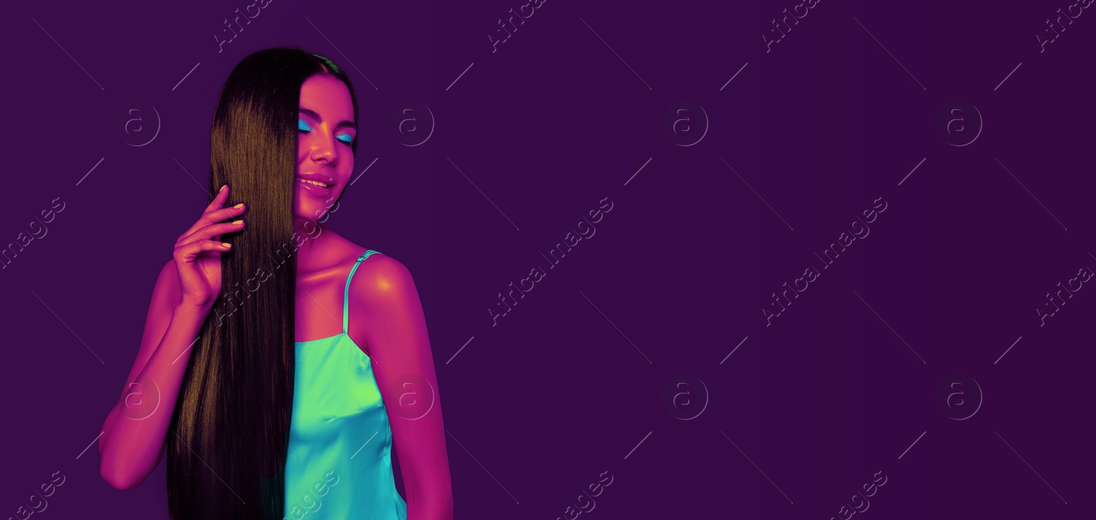 Image of Beautiful young woman in neon light, space for text. Banner design