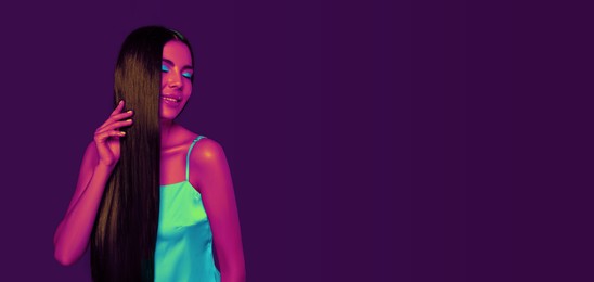 Image of Beautiful young woman in neon light, space for text. Banner design