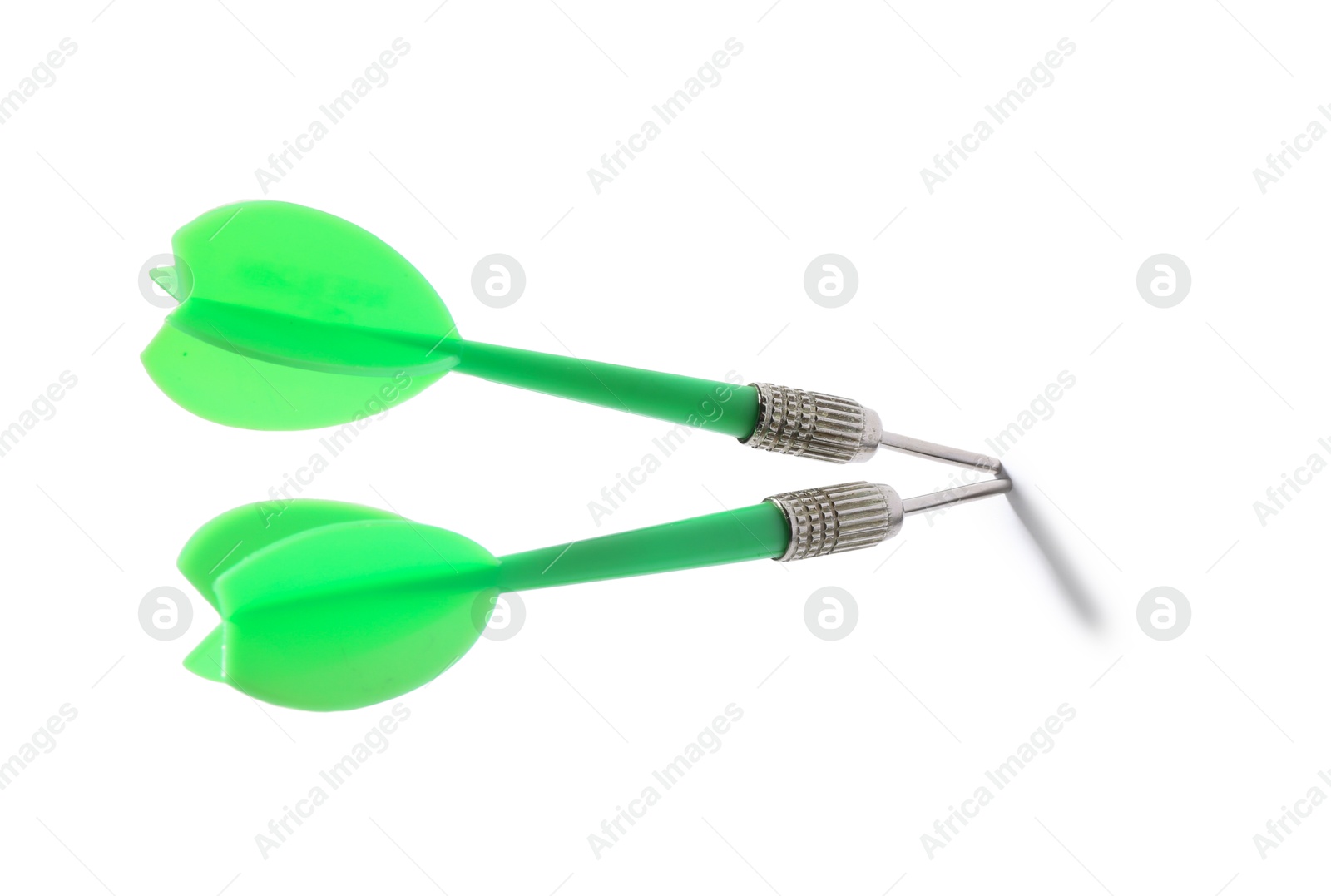 Photo of Green dart arrows isolated on white. Sports equipment