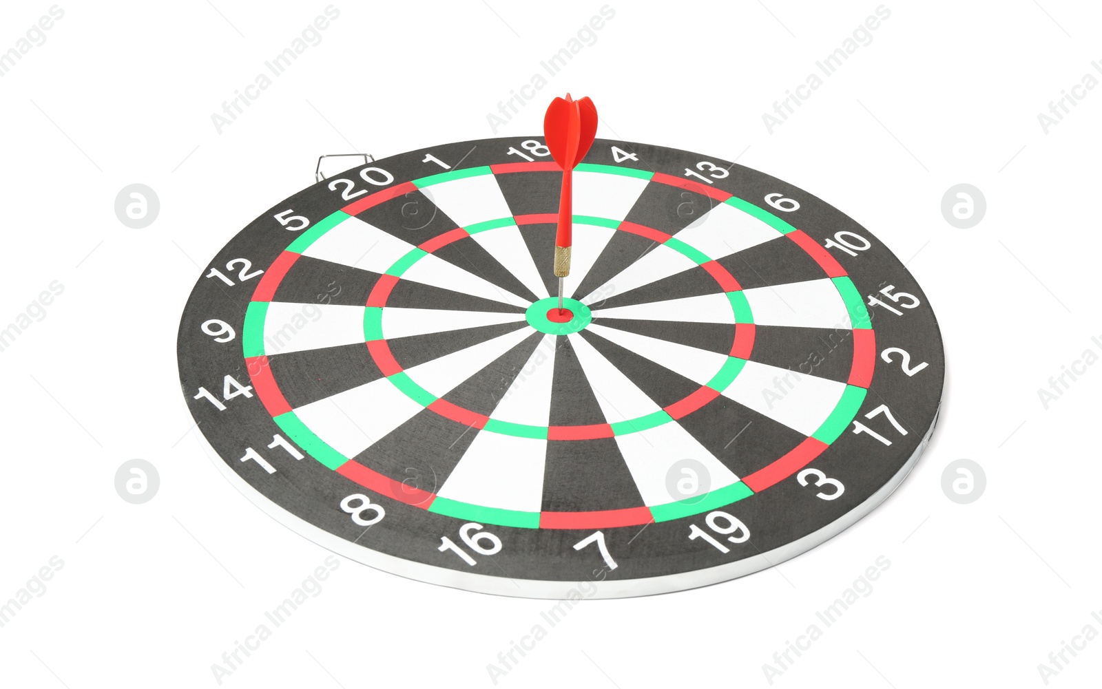 Photo of Dart board with red arrow hitting target isolated on white