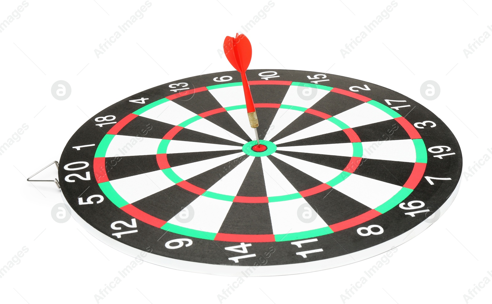 Photo of Dart board with red arrow hitting target isolated on white