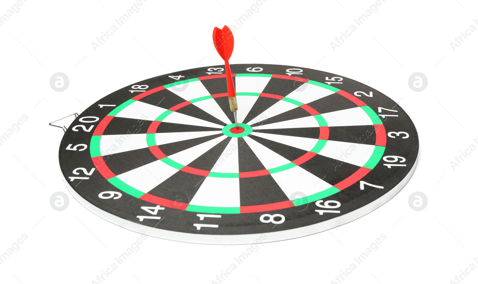 Photo of Dart board with red arrow hitting target isolated on white