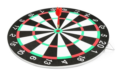 Photo of Dart board with red arrow hitting target isolated on white