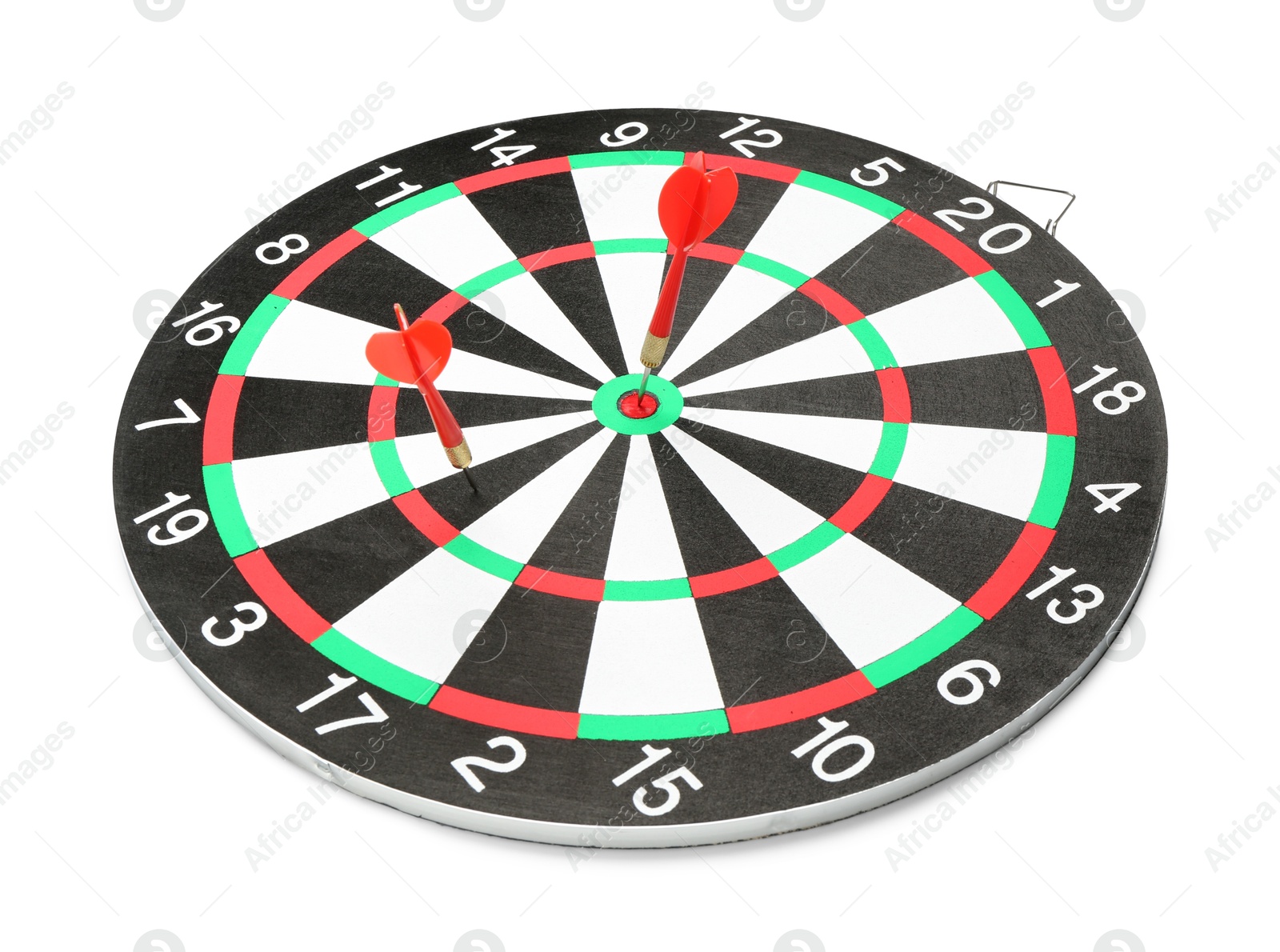 Photo of Dart board with red arrows hitting target isolated on white