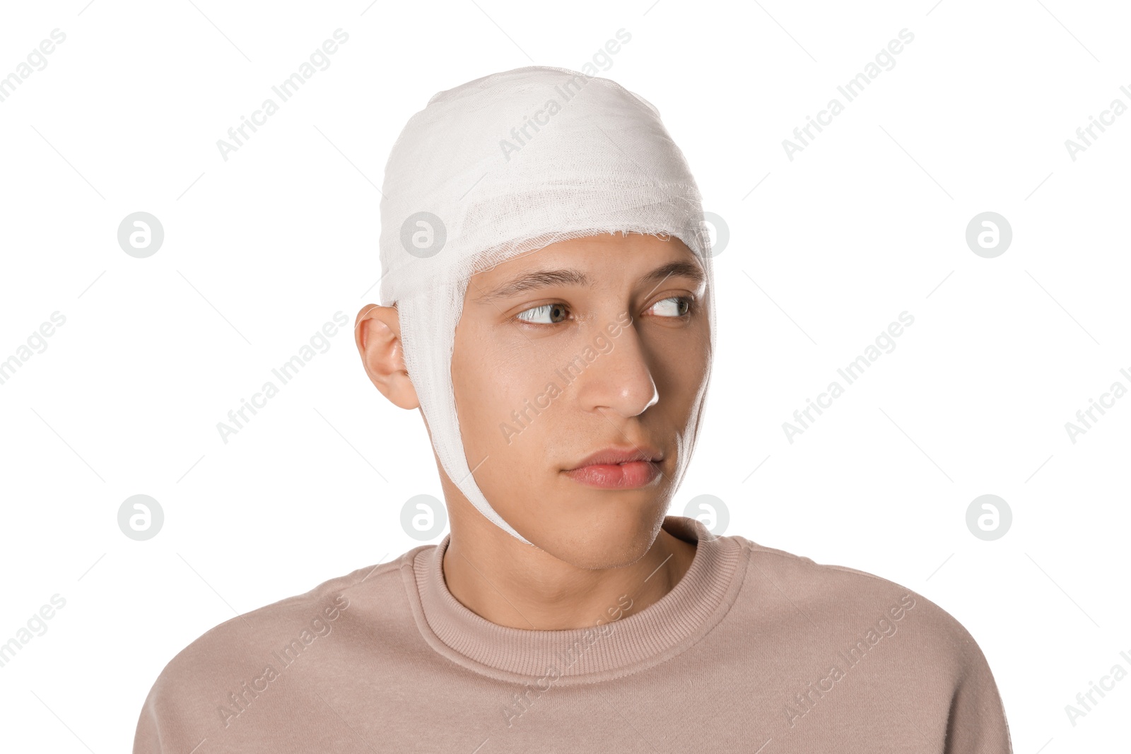 Photo of Man with head wrapped in medical bandage on white background