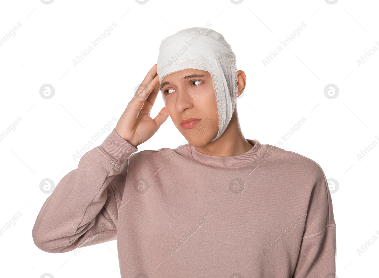 Photo of Man with head wrapped in medical bandage on white background