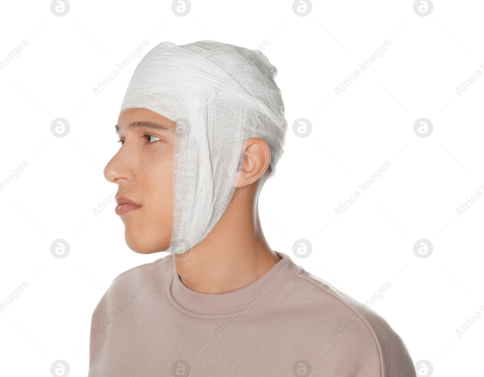 Photo of Man with head wrapped in medical bandage on white background