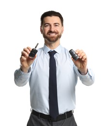 Photo of Cheerful salesman with car keys on white background