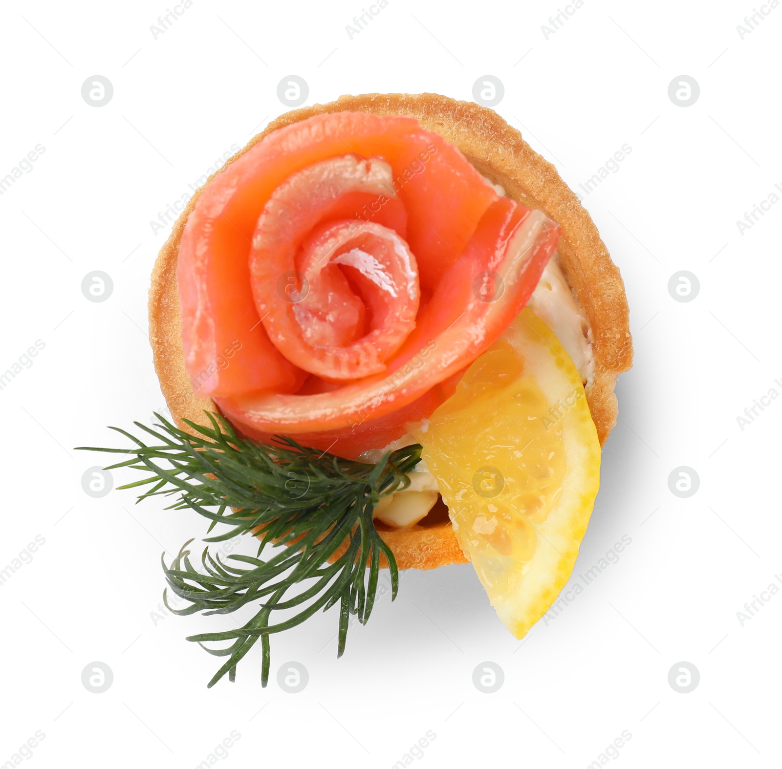 Photo of Tasty tartlet with salmon, lemon and dill isolated on white, top view