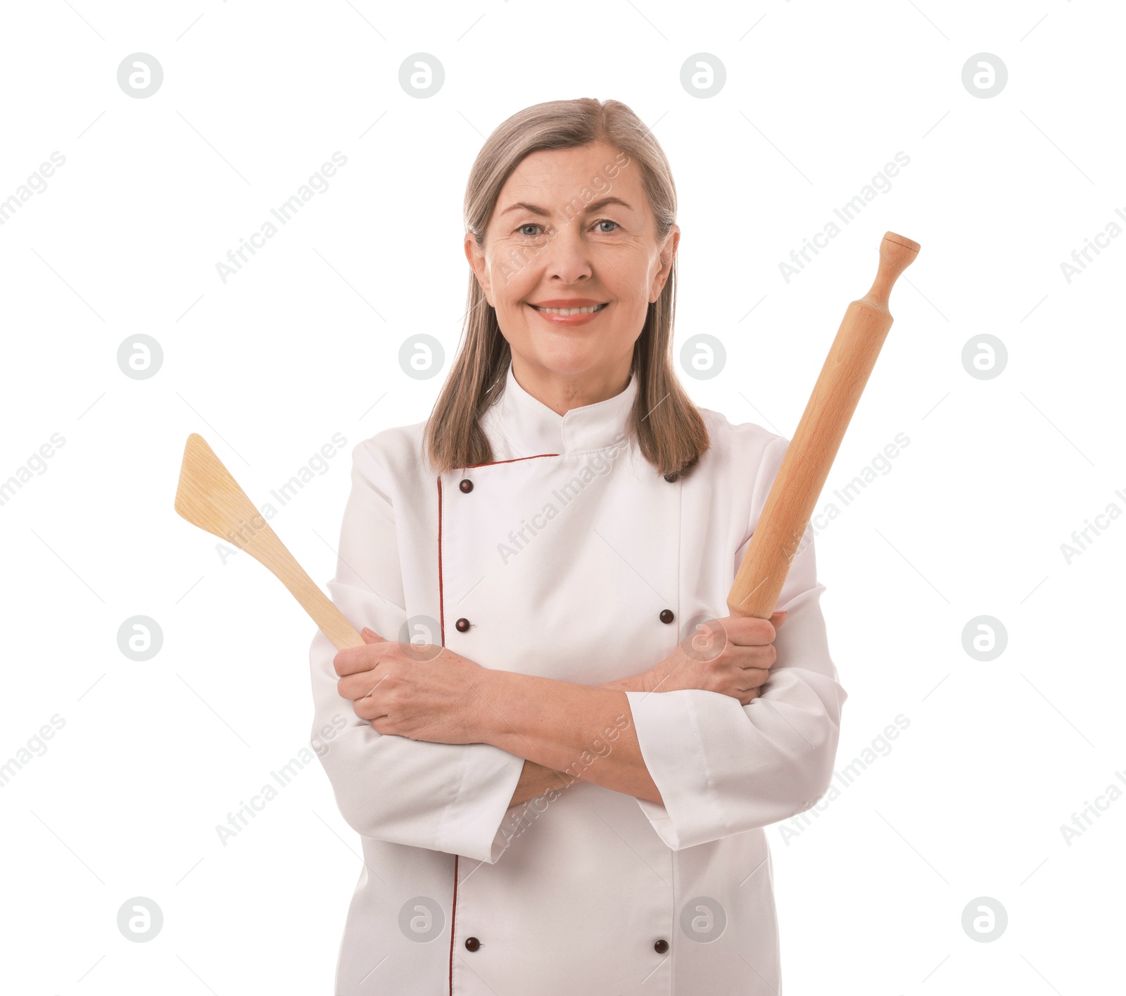 Photo of Happy chef with rolling pin and spatula on white background