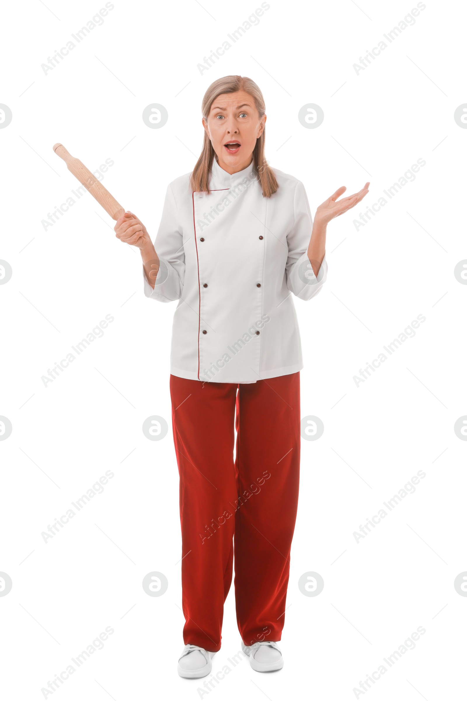 Photo of Surprised chef with rolling pin on white background