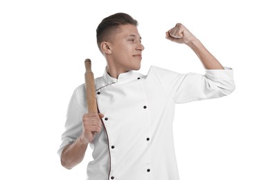 Photo of Professional chef with rolling pin showing strength on white background