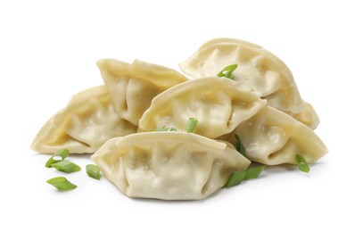 Photo of Fresh gyoza dumplings with pieces of green onion isolated on white