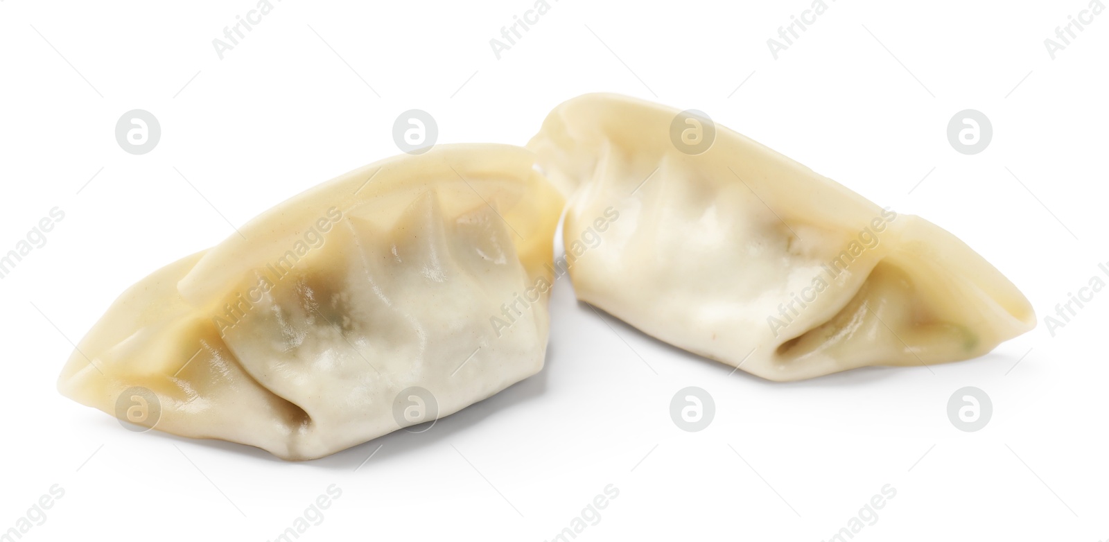 Photo of Fresh gyoza dumplings isolated on white. Chinese cuisine