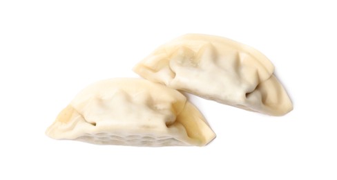 Photo of Fresh gyoza dumplings isolated on white, top view