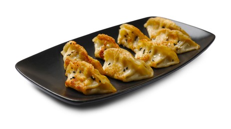 Photo of Tasty fried gyoza dumplings isolated on white