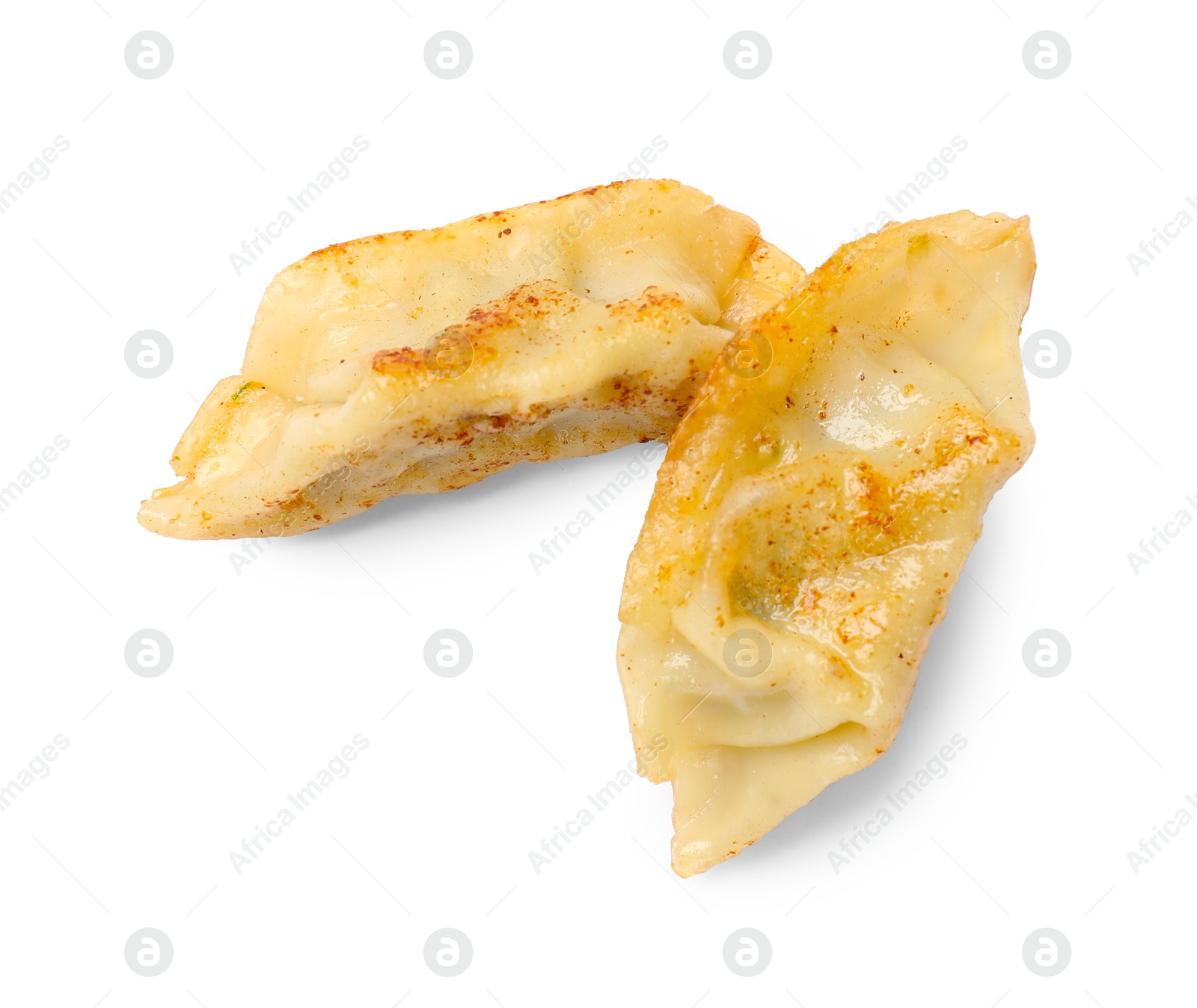 Photo of Tasty fried gyoza dumplings isolated on white