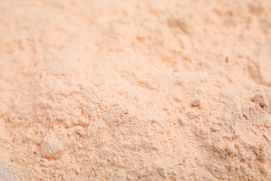 Photo of Pile of lentil flour as background, closeup