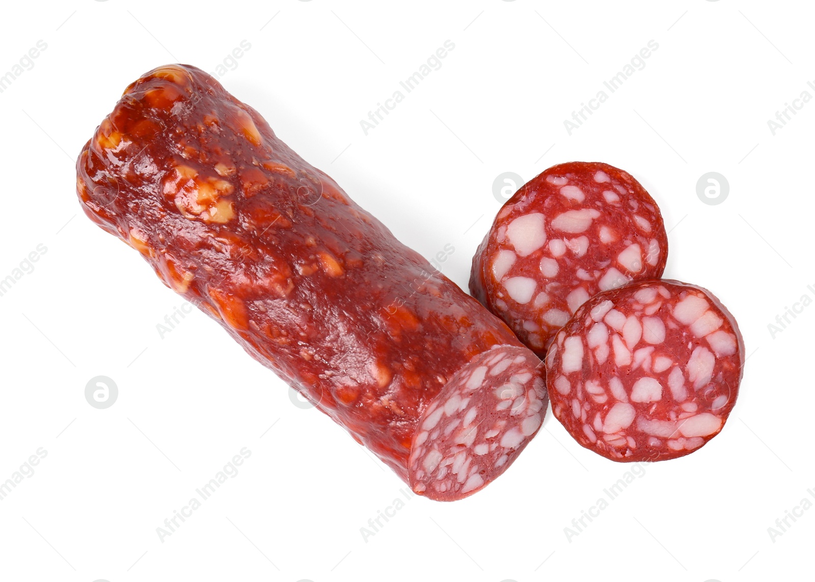 Photo of Delicious dry cured sausage isolated on white, top view