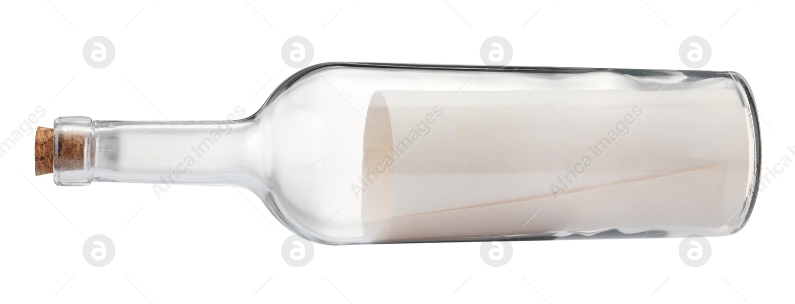 Photo of Rolled letter in corked glass bottle isolated on white