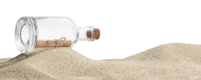 Photo of Rolled letter in corked glass bottle on sand against white background